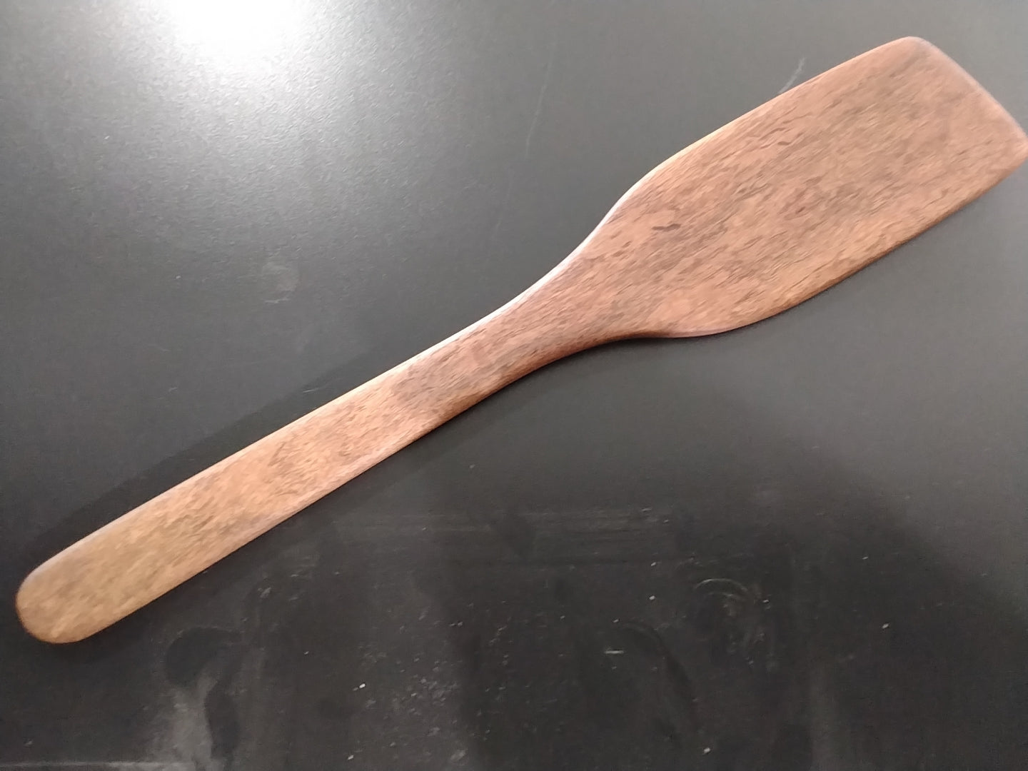 Wooden kitchen utensil